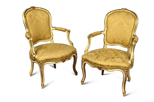 Lot 422 - A pair of 19th century parcel gilt framed salon chairs