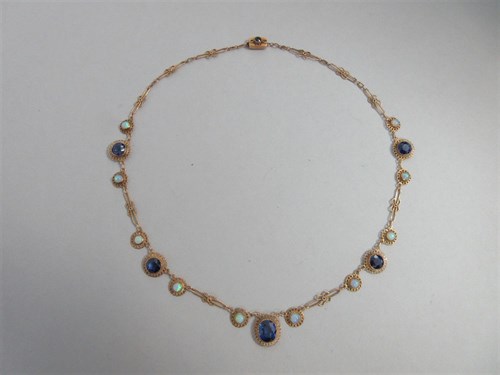 Lot 350 - A filigree necklace set with opals and synthetic sapphires