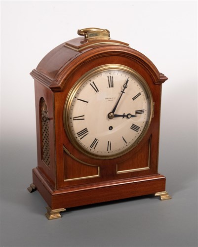 Lot 338 - A Maple & Co. London mahogany and brass mounted mantel timepiece