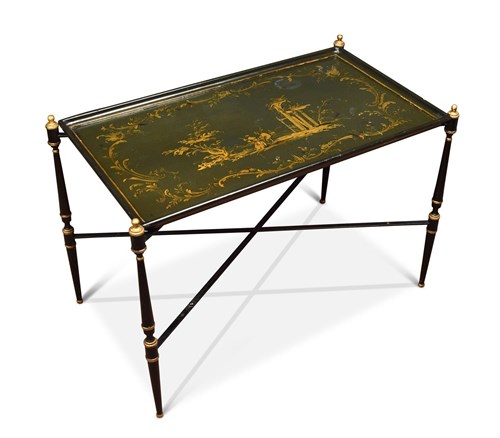 Lot 405 - A Regency japanned tray on a folding ironwork stand