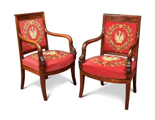 Lot 418 - A pair of Charles X mahogany open armchairs