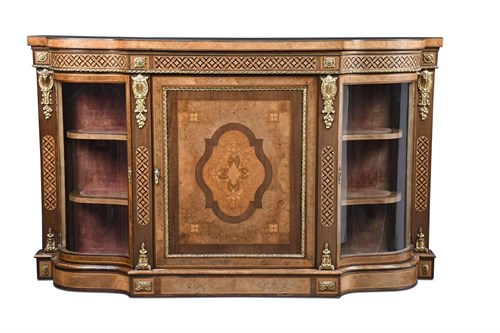 Lot 443 - A mid Victorian figured walnut breakfront credenza