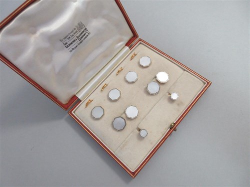 Lot 225 - A 1930s complete and cased gentleman's mother-of-pearl dress set