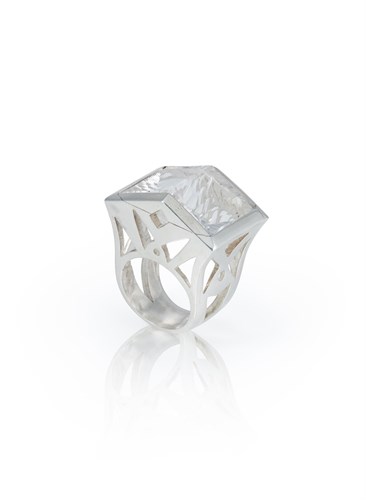 Lot 239 - A futuristic rock crystal 'knuckle duster' ring