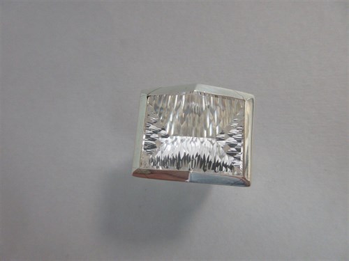 Lot 239 - A futuristic rock crystal 'knuckle duster' ring