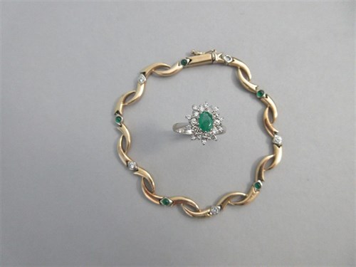 Lot 369 - A cluster ring and a bracelet both set with emeralds and diamonds