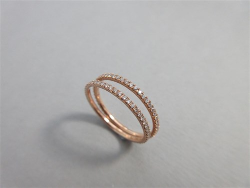 Lot 388 - A pair of full hoop diamond 'Aurora' eternity rings by Georg Jensen