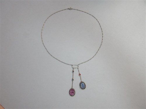 Lot 306 - An early 20th century négligée necklace set with pink and light blue star sapphires and diamonds