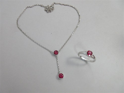 Lot 423 - A contemporary pink tourmaline ring and pendant suite set in white gold