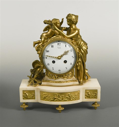 Lot 333 - A French ormolu and white marble mantel clock circa 1900