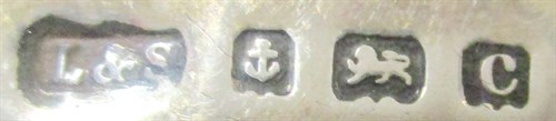 Lot 55 - A litter of four silver pigs