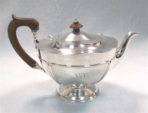 Lot 57 - An Art Nouveau style silver three piece tea set