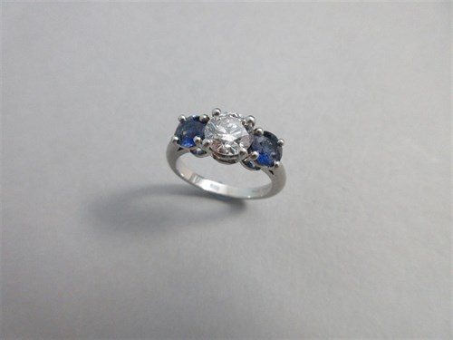 Lot 272 - A sapphire and diamond three stone ring by Tiffany