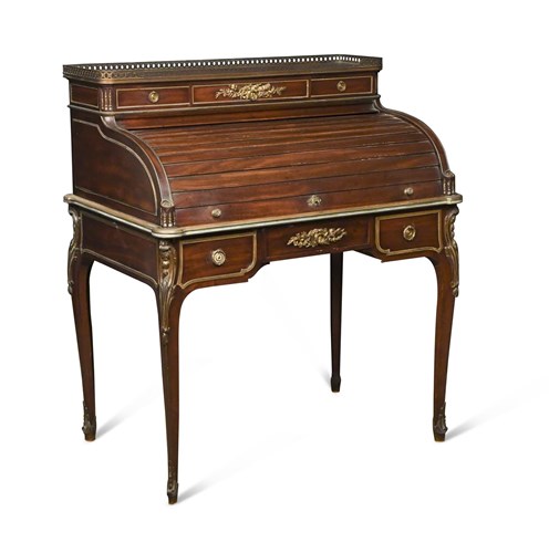Lot 429 - A Transitional style mahogany and gilt mounted bureau de dame, in the manner of Francois Linke