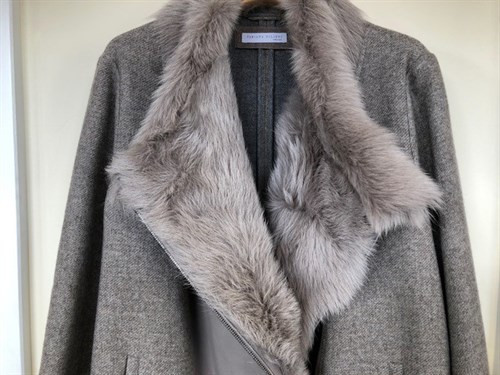 Lot 131 - A Red Valentino wool mix cream coloured evening jacket