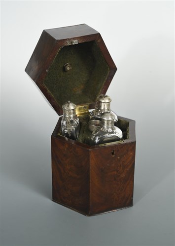 Lot 305 - A 19th century mahogany decanter box and bottles