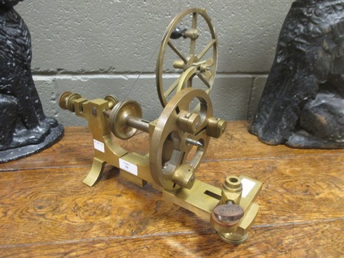 Lot 50 - A brass watchmaker's lathe