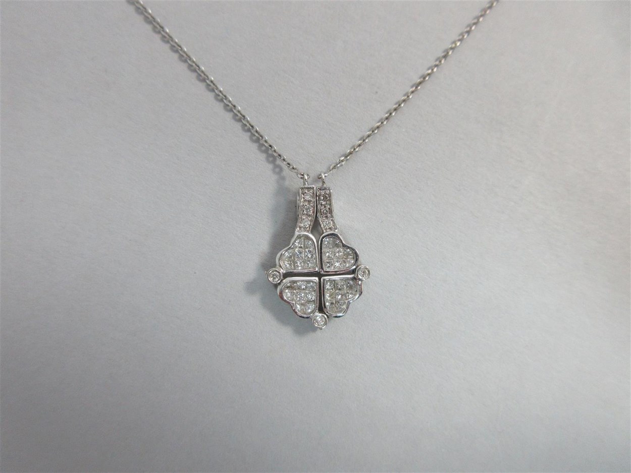 Lot 288 - A diamond set four leaf clover necklace