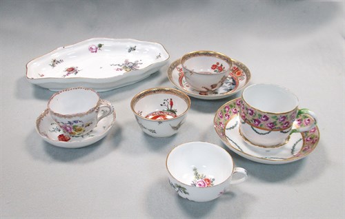 Lot 51 - Two Meissen 'hausmalerei' tea bowls and a saucer, circa 1740 