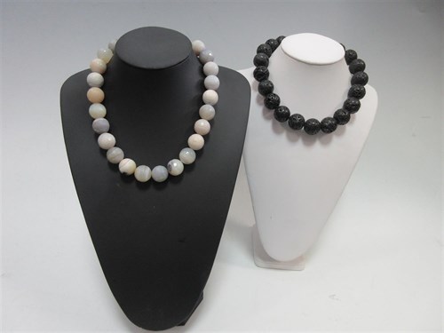 Lot 237 - A faceted grey agate bead necklace and a black lava bead necklace
