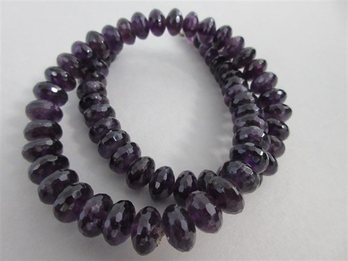 Lot 240 - A row of faceted multi coloured beryl beads and a row of faceted amethyst beads