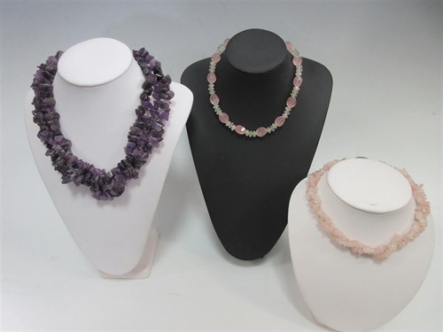 Lot 412 - A rose quartz and prehnite necklace together with a three row amethyst chip necklace and another of rose quartz chips