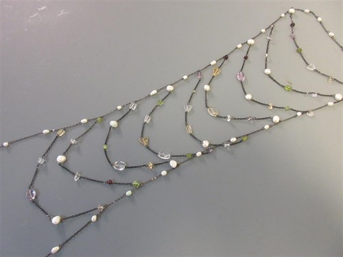 Lot 297 - A freshwater pearl and gem set 'ladder' necklace or back ornament