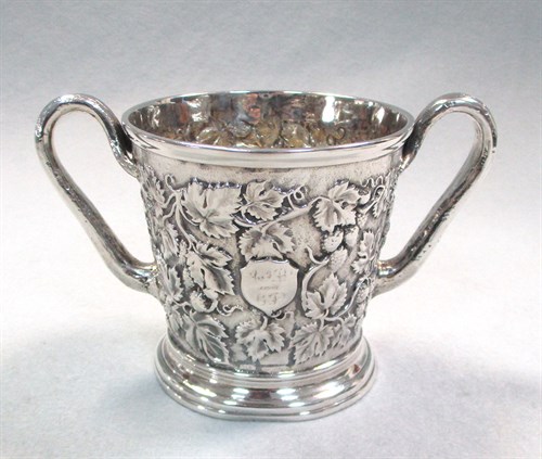 Lot 40 - A Victorian silver two handled mug by John Samuel Hunt