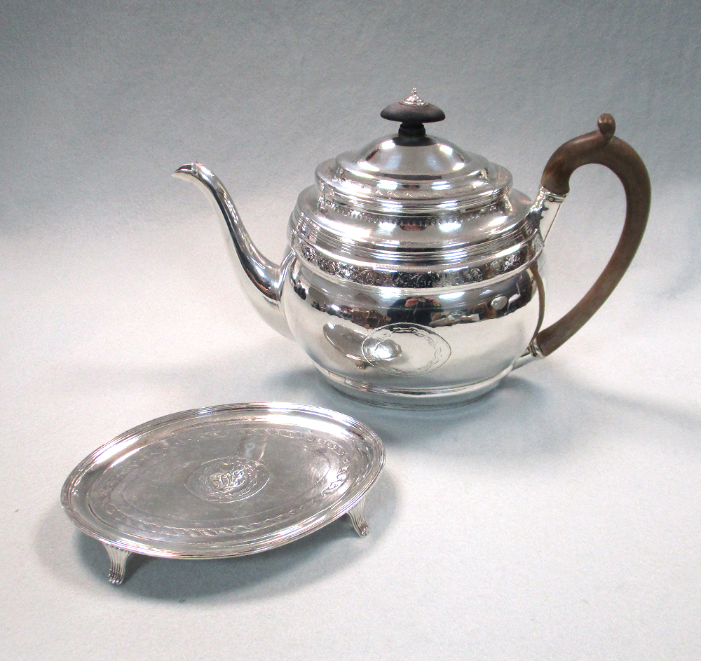 Lot 42 - A George III silver teapot and stand