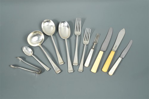 Lot 75 - A canteen containing an 82 piece set of George V silver cutlery and flatware with 24 additions