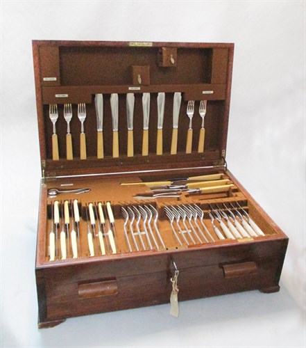 Lot 75 - A canteen containing an 82 piece set of George V silver cutlery and flatware with 24 additions