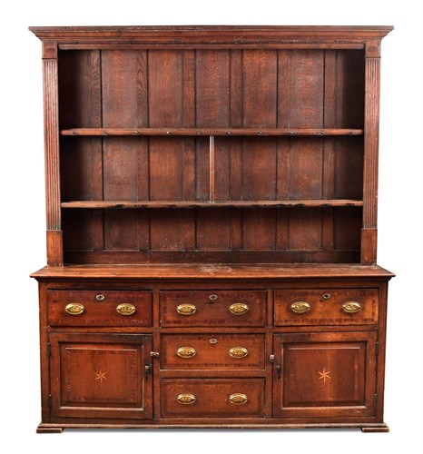 Lot 357 - A George III oak dresser