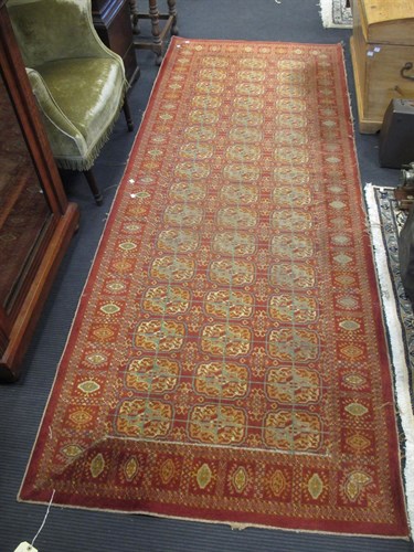 Lot 464 - A 19th century red ground rug by Turberville...