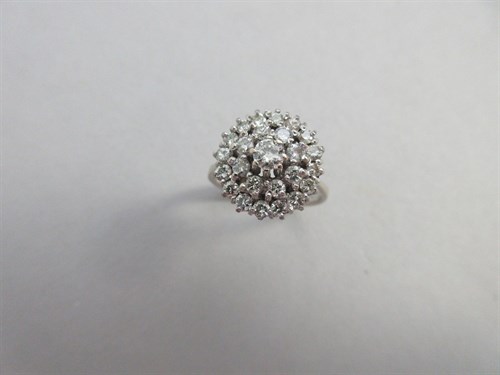 Lot 182 - A diamond cluster ring set in 18ct white gold,...