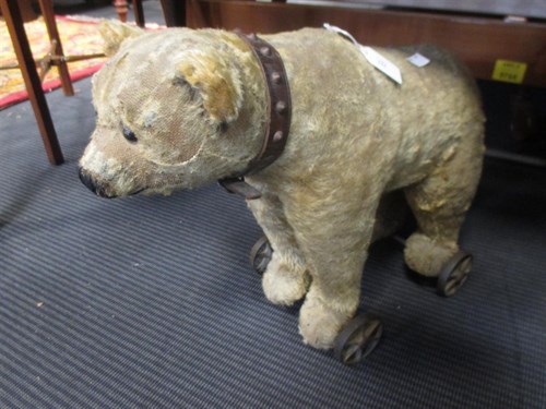 Lot 123 - A Steiff type pull along bear with growler,...