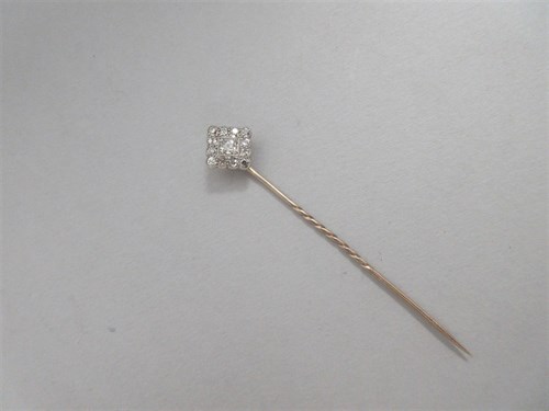 Lot 269 - A diamond set stick pin