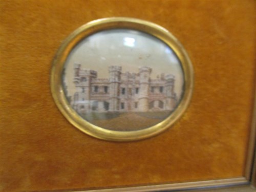 Lot 164 - A Victorian sand picture of a castle, in a...