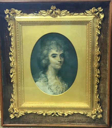 Lot 449 - A gilt metal frame decorated with oak leaves...
