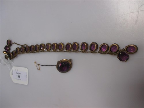 Lot 181 - A purple stone necklace and brooch (2)