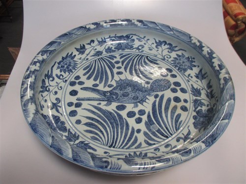 Lot 131 - Xuande marked blue and white shallow bowl,...