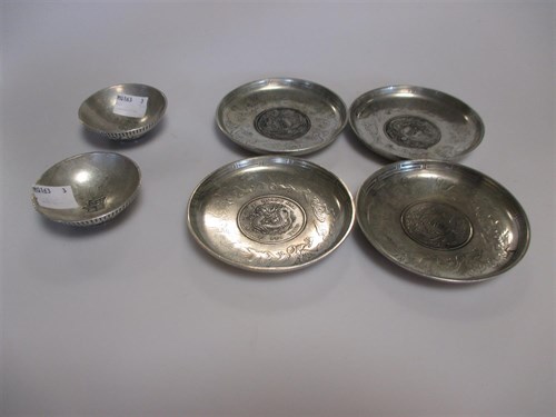 Lot 222 - Four Chinese silver dishes inset with 'Kuang...