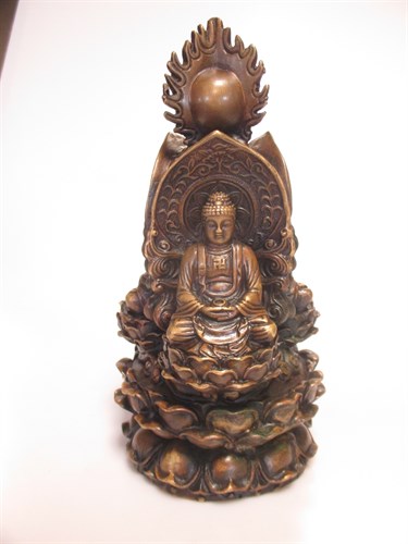 Lot 57 - A Tibetan bronze cast with three enthroned...