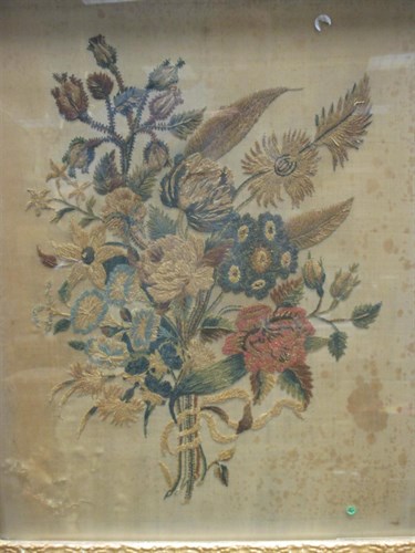 Lot 244 - A Regency woolwork picture of a bouquet of...