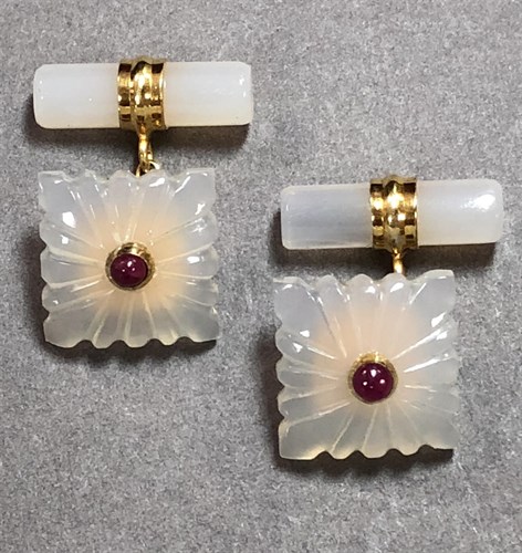 Lot 430 - A pair of chalcedony and ruby cufflinks