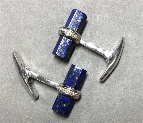 Lot 233 - A pair of lapis lazuli and diamond cufflinks
