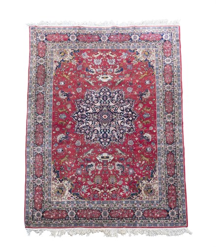 Lot 476 - A Tabriz carpet