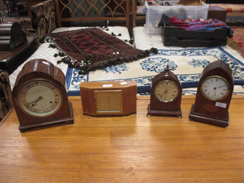 Lot 140 - Three mid 20th century mantel timepieces by...