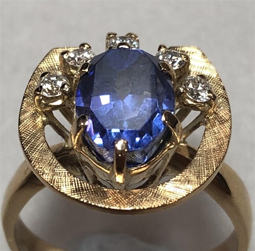 Lot 403 - A tanzanite and diamond dress ring
