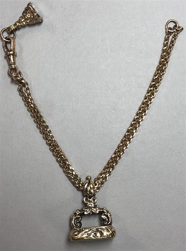 Lot 356 - A double strand chain bracelet with two hardstone set fob seals