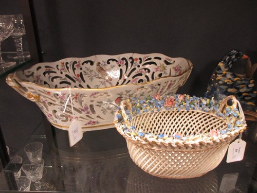 Lot 87 - A German porcelain two handled basket, painted...